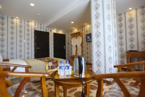 Posezení v ubytování Baigal Hotel