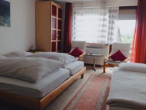 Postel nebo postele na pokoji v ubytování Eifelhof Weina