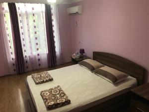 Letto o letti in una camera di Mari Guest House