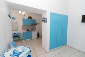 Kuchyň nebo kuchyňský kout v ubytování Kallithea Studios