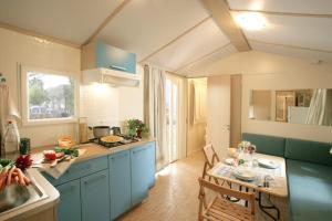 Ein Sitzbereich in der Unterkunft New Camping Le Tamerici