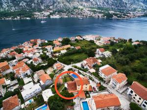 an aerial view of a city with a red circle at Garden Vista Stone House in Kotor