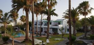 an aerial view of a resort with palm trees at Paradise Club L28 & L29 in Puerto del Carmen