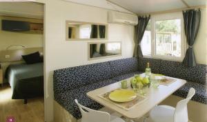 Ein Sitzbereich in der Unterkunft New Camping Le Tamerici