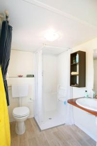 Ein Badezimmer in der Unterkunft New Camping Le Tamerici