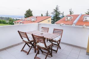 Balkón nebo terasa v ubytování Apartma Joy - private beach