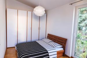 Postel nebo postele na pokoji v ubytování Apartma Joy - private beach
