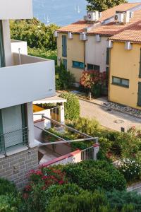 a view from the balcony of a building at Apartma Joy - private beach in Ankaran