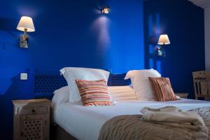 Oustau Camarguen Hôtel & Spa客房内的一张或多张床位
