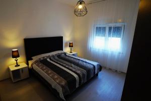 Posteľ alebo postele v izbe v ubytovaní Casa Gremar