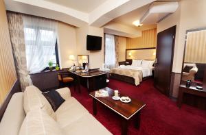 Posteľ alebo postele v izbe v ubytovaní Hotel Wielopole