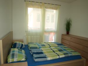 Posteľ alebo postele v izbe v ubytovaní Apartman Self check in/out Vrchlabi