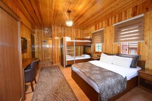 Cama ou camas em um quarto em Goblec Hotel & Bungalow