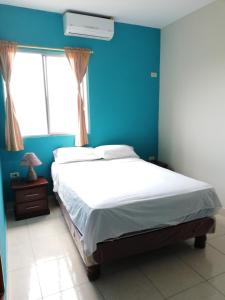 Postel nebo postele na pokoji v ubytování Hostal El Naufrago 1