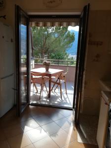 A balcony or terrace at Donatella Apartment