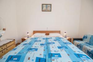 Posteľ alebo postele v izbe v ubytovaní Apartments Josip by the sea