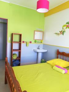 Postel nebo postele na pokoji v ubytování Hotel De la Plage