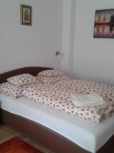 Voodi või voodid majutusasutuse Orchidea Apartman toas