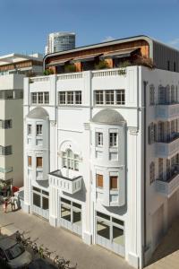 an architectural rendering of a white building at Mr. Katinsky - By TLV2GO in Tel Aviv