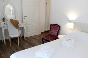 A bed or beds in a room at Casa Maiò