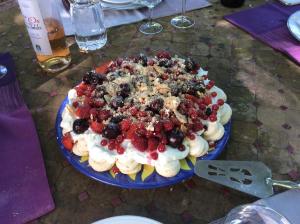 a fruit salad on a blue plate on a table at Chateau de Laric in Chabestan