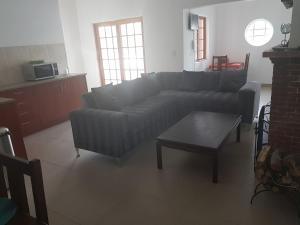 Ruang duduk di Fama Lodge Rm13