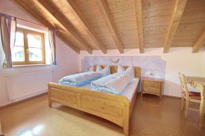 Postel nebo postele na pokoji v ubytování Haus Göhl