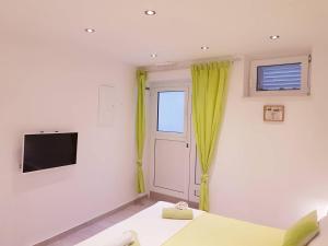 Et tv og/eller underholdning på Apartments Nona 1