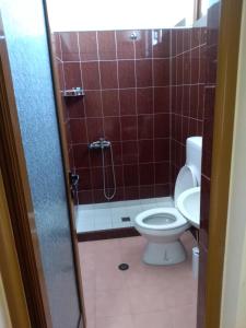 Koupelna v ubytování Hotel Gjeli