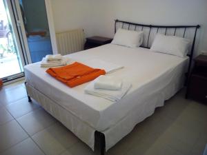 Posteľ alebo postele v izbe v ubytovaní Fiona Seafront Apartments