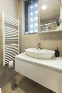 Koupelna v ubytování Spacious modern apartment close to the beach