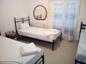 Posteľ alebo postele v izbe v ubytovaní Fiona Seafront Apartments