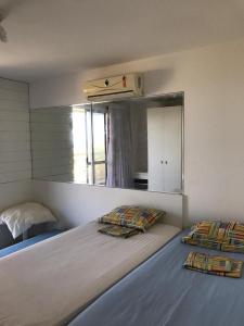 Postel nebo postele na pokoji v ubytování Porta maris resort + 12 fotografií