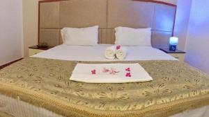 Letto o letti in una camera di Hotel Pishat e Buta