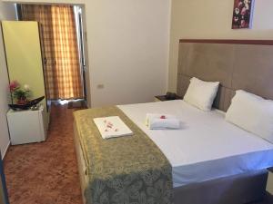Letto o letti in una camera di Hotel Pishat e Buta