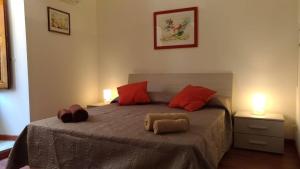 Posteľ alebo postele v izbe v ubytovaní A casa di Lori