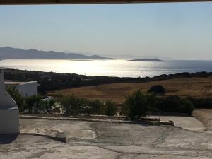 a view of the ocean from a house at Ergina Summer Resort in Antiparos