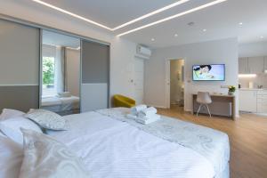 Posteľ alebo postele v izbe v ubytovaní AML apartments