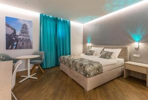 Posteľ alebo postele v izbe v ubytovaní AML apartments