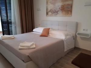 Postel nebo postele na pokoji v ubytování Villa Zoe