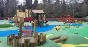a playground with many different types of play equipment at Teviot View Holiday Let’s Hawick in Hawick