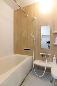 Vannituba majutusasutuses Guesthouse Tokushima