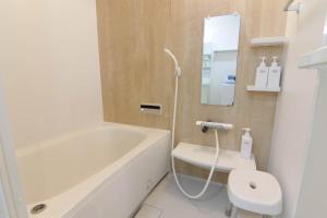Vannituba majutusasutuses Guesthouse Tokushima