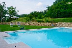 Bazén v ubytování Agriturismo Ronchi Di Sant'Egidio nebo v jeho okolí