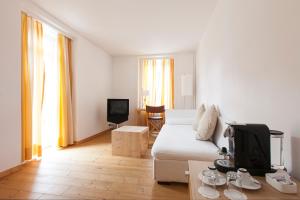 TV a/nebo společenská místnost v ubytování Hotel Müller - mountain lodge