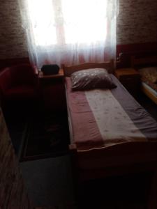 Posteľ alebo postele v izbe v ubytovaní aura