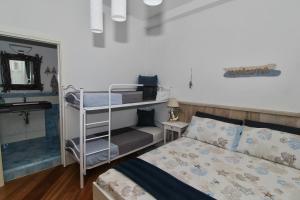 Letto o letti in una camera di B&B Sea and Garden
