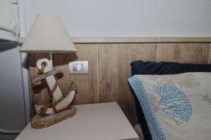 Letto o letti in una camera di B&B Sea and Garden