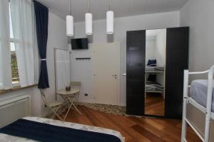 Letto o letti in una camera di B&B Sea and Garden