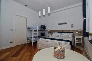Letto o letti in una camera di B&B Sea and Garden